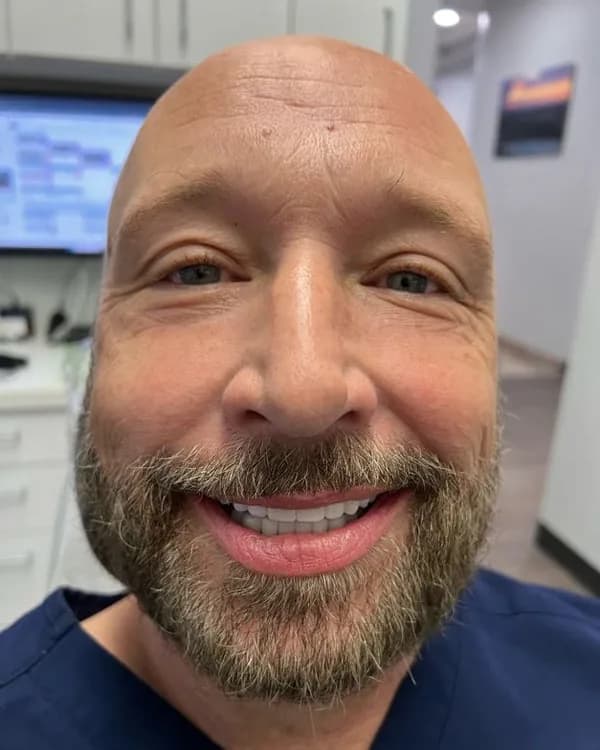 Acacia Dental patient sharing his smile after treatment