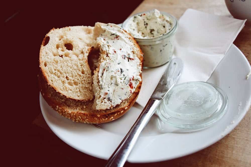 A bagel with cream cheese